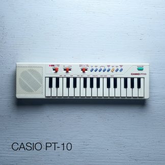 An image of a Casio PT-10 synthesizer with the words "Casio PT-10" in the lower left-hand corner.